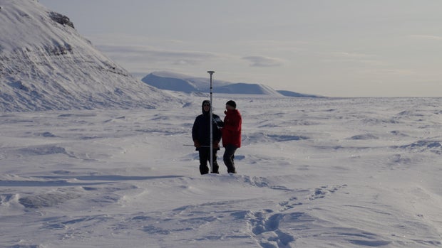 Scientists checking a glacier 