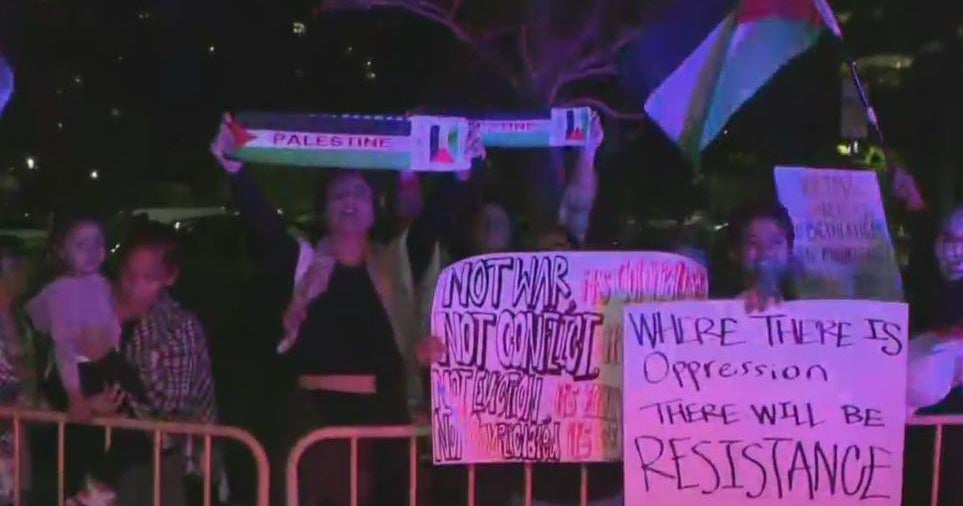 Professional-Palestinian group holds protest at Town of Miami Tree-lighting Ceremony Professional-Palestinian group holds protest at Town of Miami Tree-lighting Ceremony