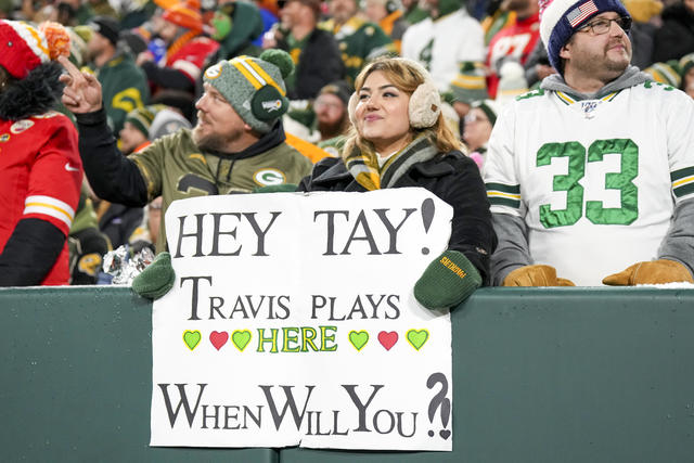Kansas City Chiefs fan dons cheese-grater hat for Sunday Night Football  clash in Green Bay as Packers backers vie for Taylor Swift and Simone  Biles' attention with colorful signs
