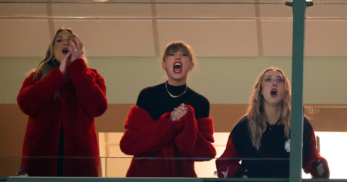 Dupes of Taylor Swift's red coat at Lambeau for Packers/Chiefs game