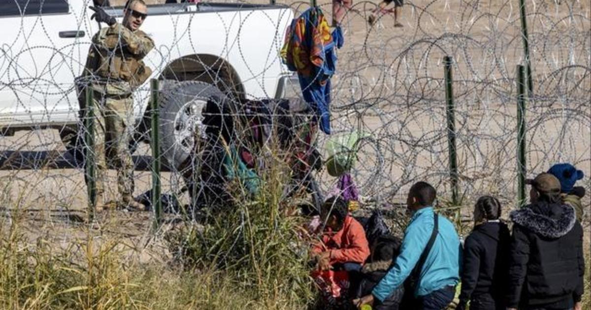 Spike In Migrant Crossings At U.S.-Mexico Border - CBS News