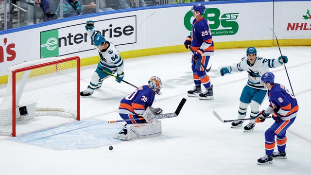 San Jose Sharks Left Wing William Eklund (72) celebrates scoring a goal in overtime past New York Islanders Goalie Ilya Sorokin (30) while San Jose Sharks Right Wing Mitchell Russell (64) and New York Islanders Center Brock Nelson (29) and Defenceman Noah