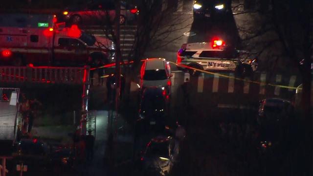 An aerial view of NYPD surrounding a home in Queens. 