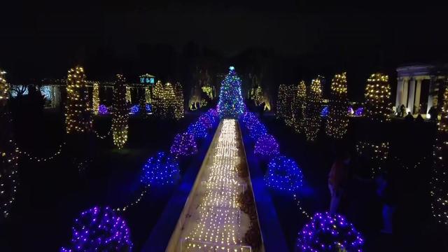 Lights illuminate architecture and topiaries in Untermyer Park and Gardens. 
