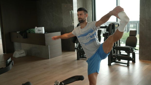 Novak Djokovic stretching