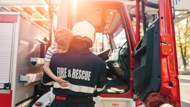 Firefighter saving little boy 