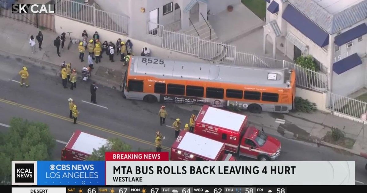 MTA bus driver, 3 passengers injured after backing into retaining wall ...