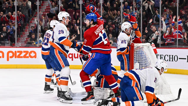 Josh Anderson #17 of the Montreal Canadiens raises his arm as he celebrates his goal during the second period against the New York Islanders at the Bell Centre on December 16, 2023 in Montreal, Quebec, Canada. 