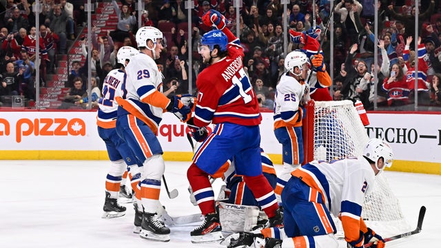 Josh Anderson #17 of the Montreal Canadiens raises his arm as he celebrates his goal during the second period against the New York Islanders at the Bell Centre on December 16, 2023 in Montreal, Quebec, Canada.