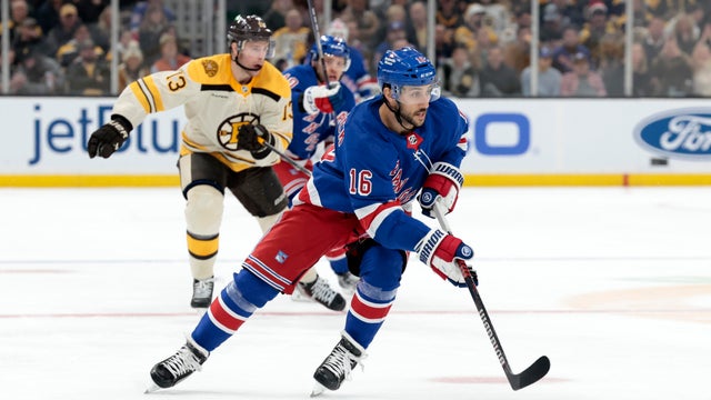 New York Rangers center Vincent Trocheck (16) gains the blue line during a game between the Boston Bruins and the New York Rangers on December 16, 2023, at TD Garden in Boston, Massachusetts.