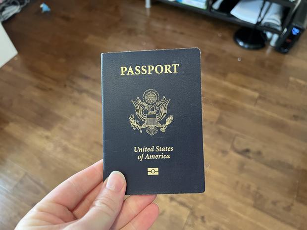 A person holds a U.S. passport in Lafayette, California, on May 23, 2023. 