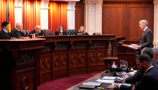 Attorney Eric Olson, far right, argues before the Colorado Supreme Court on Dec. 6, 2023, in Denver.