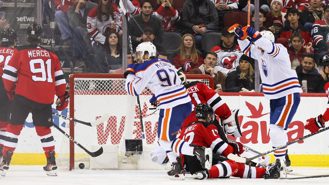 Edmonton Oilers center Connor McDavid (97) celebrates after scoring a goal during a game between the Edmonton Oilers and New Jersey Devils on December 21, 2023 at Prudential Center in the Newark, New Jersey. 
