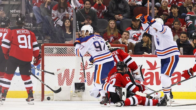 Edmonton Oilers center Connor McDavid (97) celebrates after scoring a goal during a game between the Edmonton Oilers and New Jersey Devils on December 21, 2023 at Prudential Center in the Newark, New Jersey.