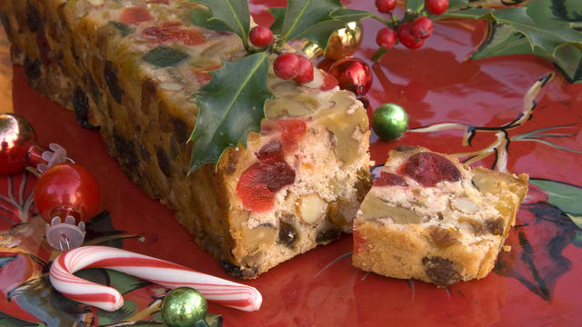 Christmas Fruit Cake & Peppermint Candy Cane, Holiday Dessert Food Background 
