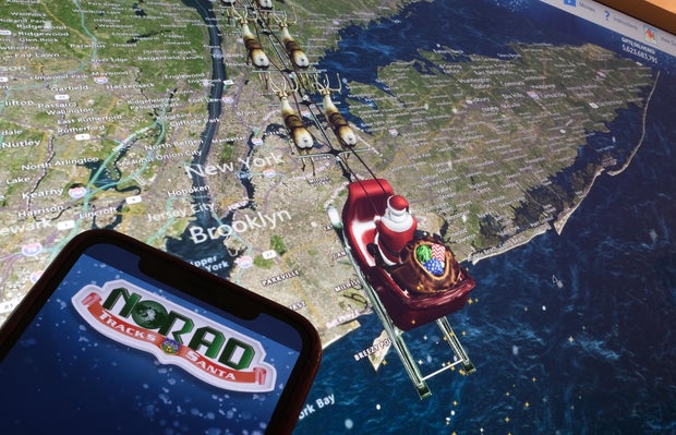 This illustration shows NORAD's tracker following Santa flying over New York City on a computer monitor on Dec. 24, 2023