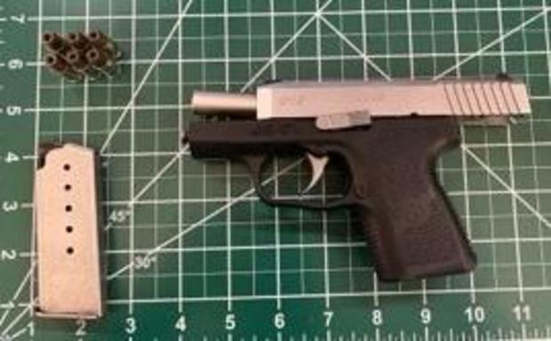 This loaded handgun was caught in a carry- 