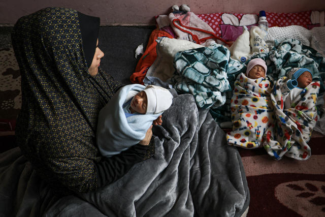 Gaza family tries to protect newborn quadruplets amid destruction of war -  CBS News