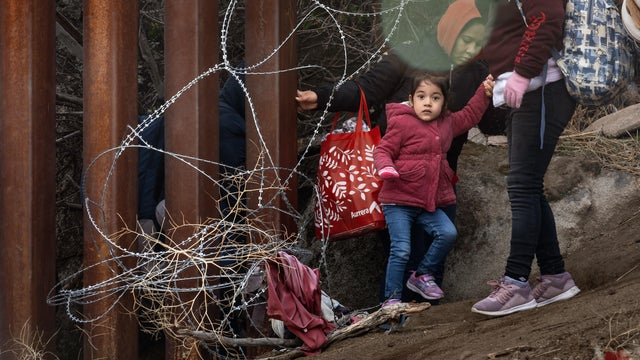 Migrants At The US-Mexico Border As Crossings Increase