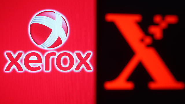 In this photo illustration the Xerox logo is seen on a 