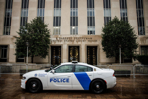 A law enforcement vehicle and barricades block an entrance to E. Barrett Prettyman U.S. Courthouse in Washington, D.C., on Jan. 9, 2024. 