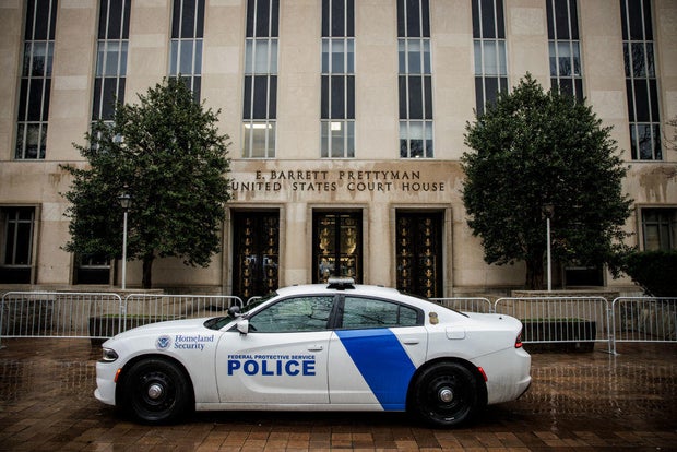 A law enforcement vehicle and barricades block an entrance to E. Barrett Prettyman U.S. Courthouse in Washington, D.C., on Jan. 9, 2024.
