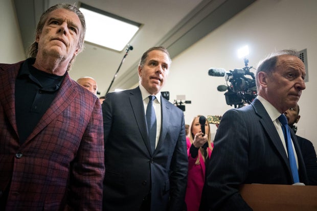 Hunter Biden, center, flanked by Kevin Morris, left, and attorney Abbe Lowell, right, departs a House Oversight Committee meeting on Jan, 10, 2024