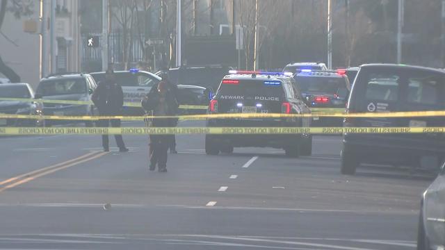 Crime scene tape blocks off a Newark street. 