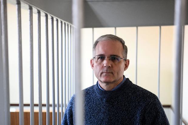 Paul Whelan stands inside a defendants' cage during a hearing at a court in Moscow on Aug. 23, 2019. 