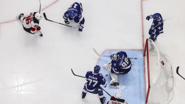 Goalie Andrei Vasilevskiy #88, Victor Hedman #77, Luke Glendening #11, Darren Raddysh #43, and Michael Eyssimont #23 of the Tampa Bay Lightning battle against Max Willman #46 and Shane Bowers #15 of the New Jersey Devils during the second period at Amalie 