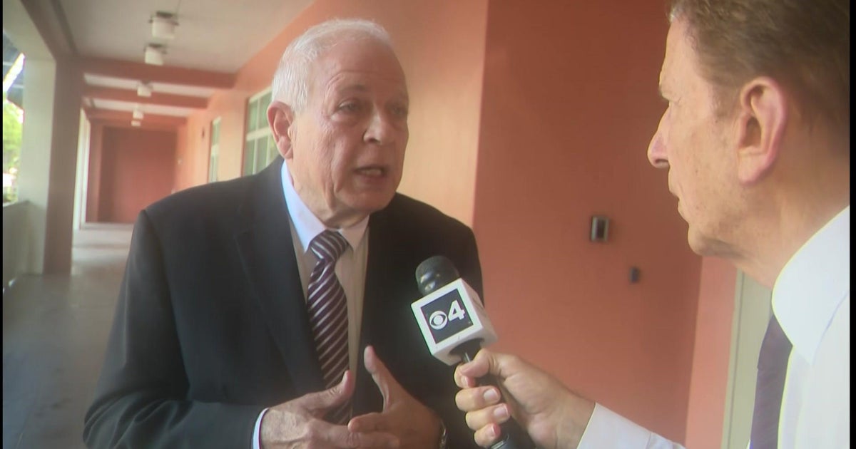 Ex-Miami Mayor Tomas Regalado reacts to heated argument among commissioners