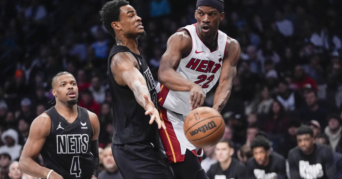 Jimmy Butler scored 31 points, including two late free throws in overtime, to lead the Miami Heat to victory over the Brooklyn Nets 96-95.