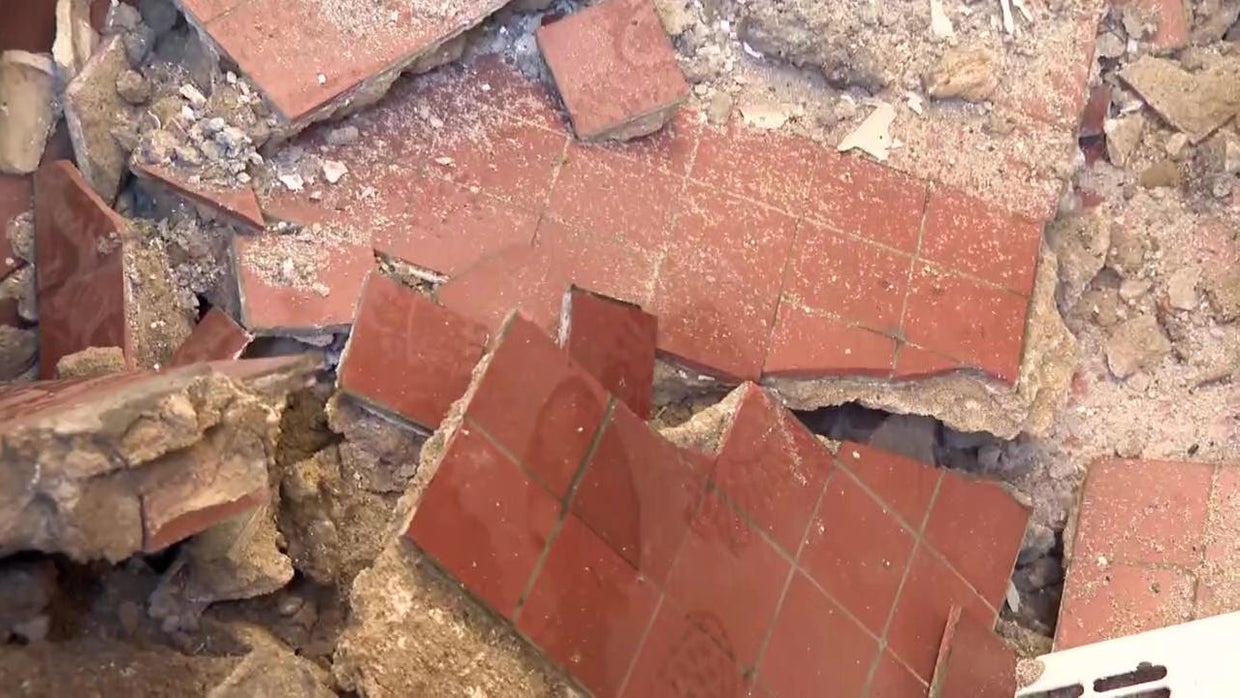 Floor partially collapses inside lobby of Queens apartment building ...