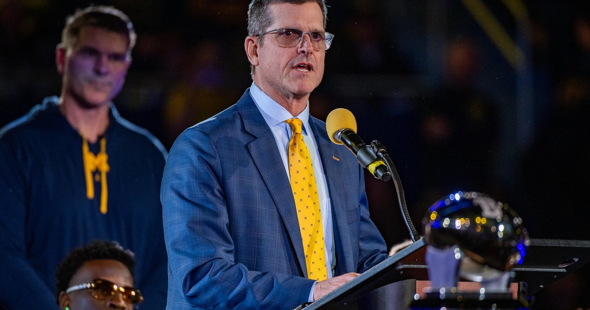 Michigan football coach Jim Harbaugh interviews with Atlanta Falcons
