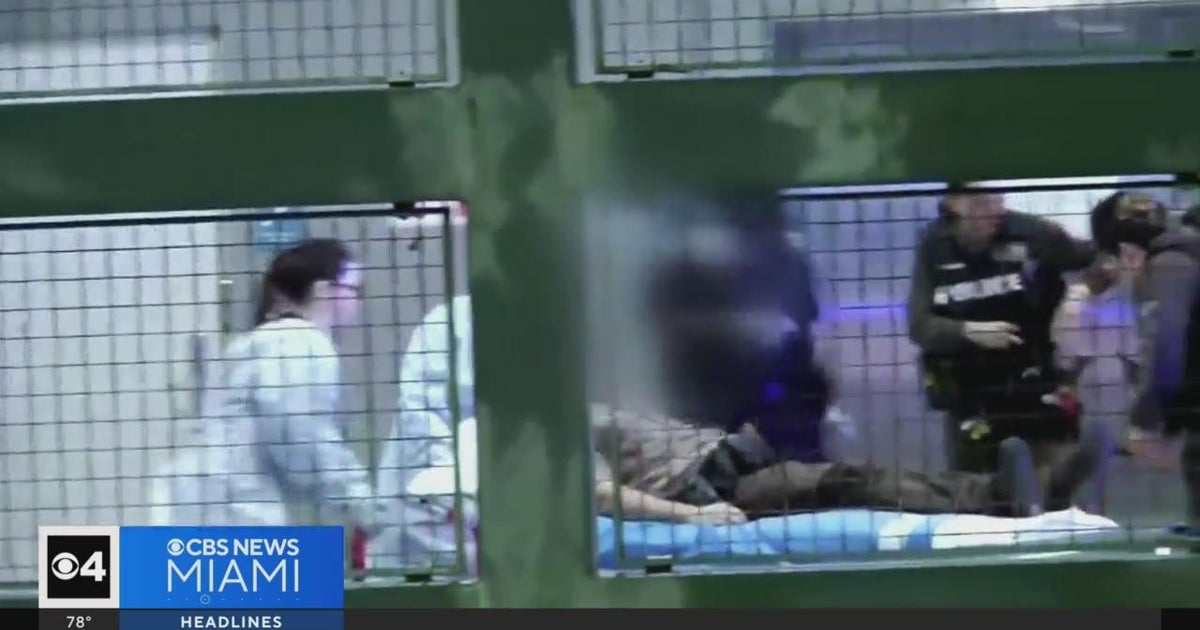 Two Miami-Dade officers shot when named to a household about squatters Two Miami-Dade officers shot when named to a household about squatters