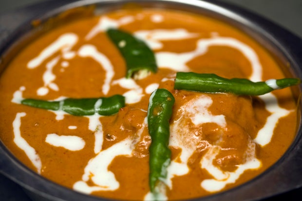 India - Delhi - A dish of butter chicken at Moti Mahal Restaurant
