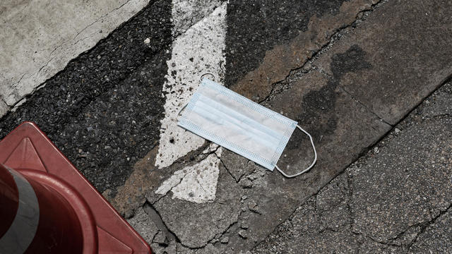 Used surgical mask was left on the street 