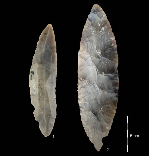 Stone tools excavated from Ilsenhohle cave in the German town of Ranis are seen in a composite image