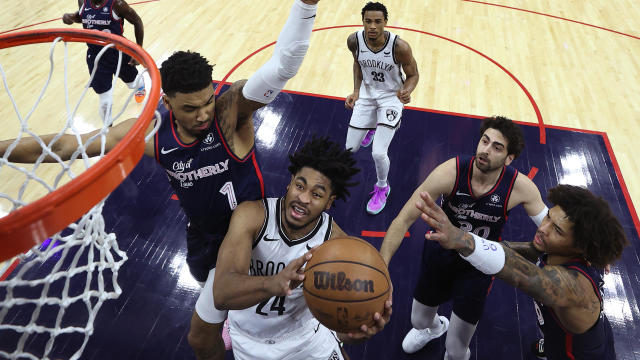 Cam Thomas #24 of the Brooklyn Nets shoots a lay up among KJ Martin #1, Furkan Korkmaz #30 and Kelly Oubre Jr. #9 of the Philadelphia 76ers during the first quarter at the Wells Fargo Center on February 03, 2024 in Philadelphia, Pennsylvania. 