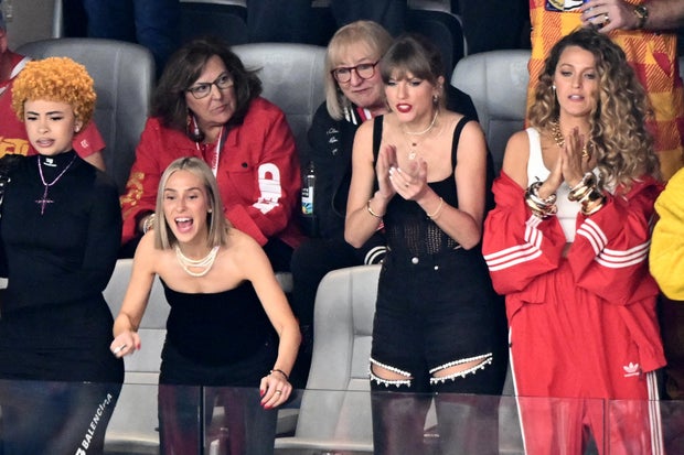 Taylor Swift, with rapper Ice Spice, Ashley Avignone and Blake Lively, cheering at Super Bowl LVIII