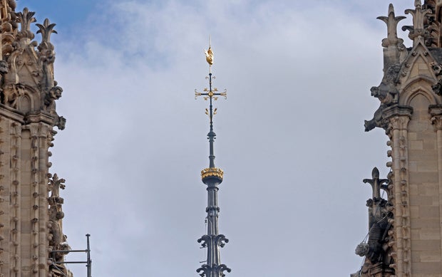 Notre-Dame Cathedral Spire And Rooster Return To The Paris Skyline