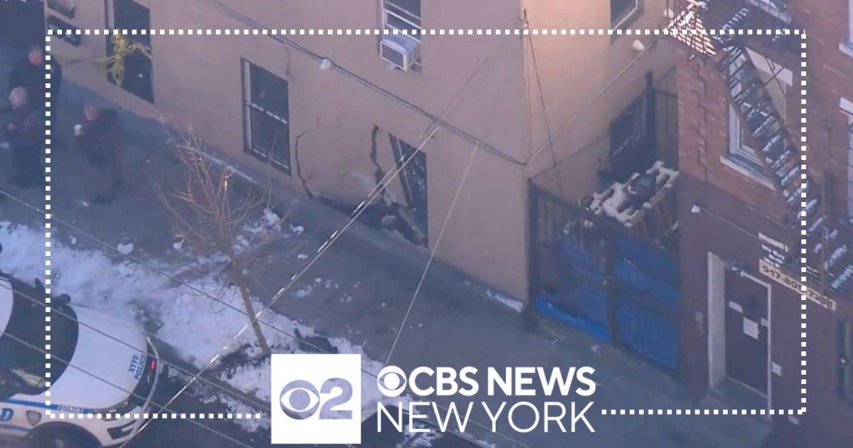 Car slams into Bronx building - CBS New York