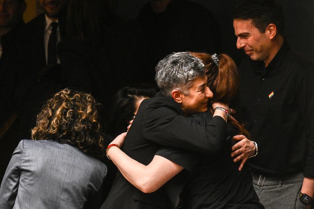 Visitors react after the parliamentary vote on same-sex marriage in Athens, Greece, on February 15, 2024