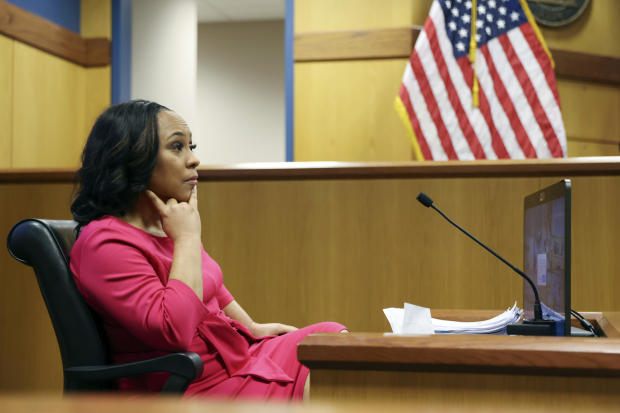 Fulton County District Attorney Fani Willis takes the stand as a witness during a hearing on the Georgia election interference case, Thursday, Feb. 15, 2024, in Atlanta. 