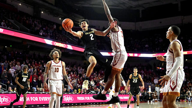 Colorado Buffaloes defeated the USC Trojans 92-89 in double overtime to win a Men's NCAA basketball game. 