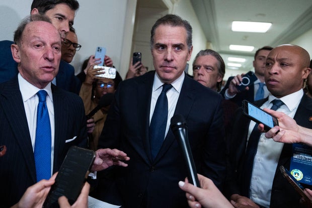 Hunter Biden, center, and his attorney Abbe Lowell, left, address the media on Capitol Hill on Jan. 10, 2024.