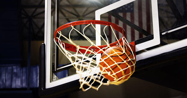 Basketball in hoop 
