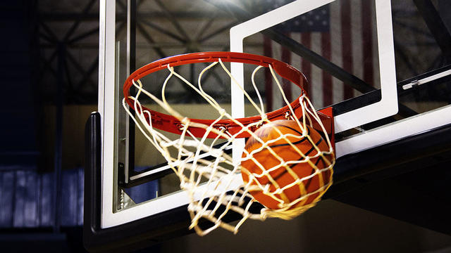 Basketball in hoop 