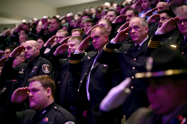 Burnsville, Minn. slain police officers and paramedic memorial service funeral 