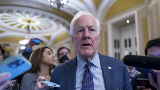 Sen. John Cornyn speaks to reporters at the Capitol on Wednesday, Feb. 7, 2024. 